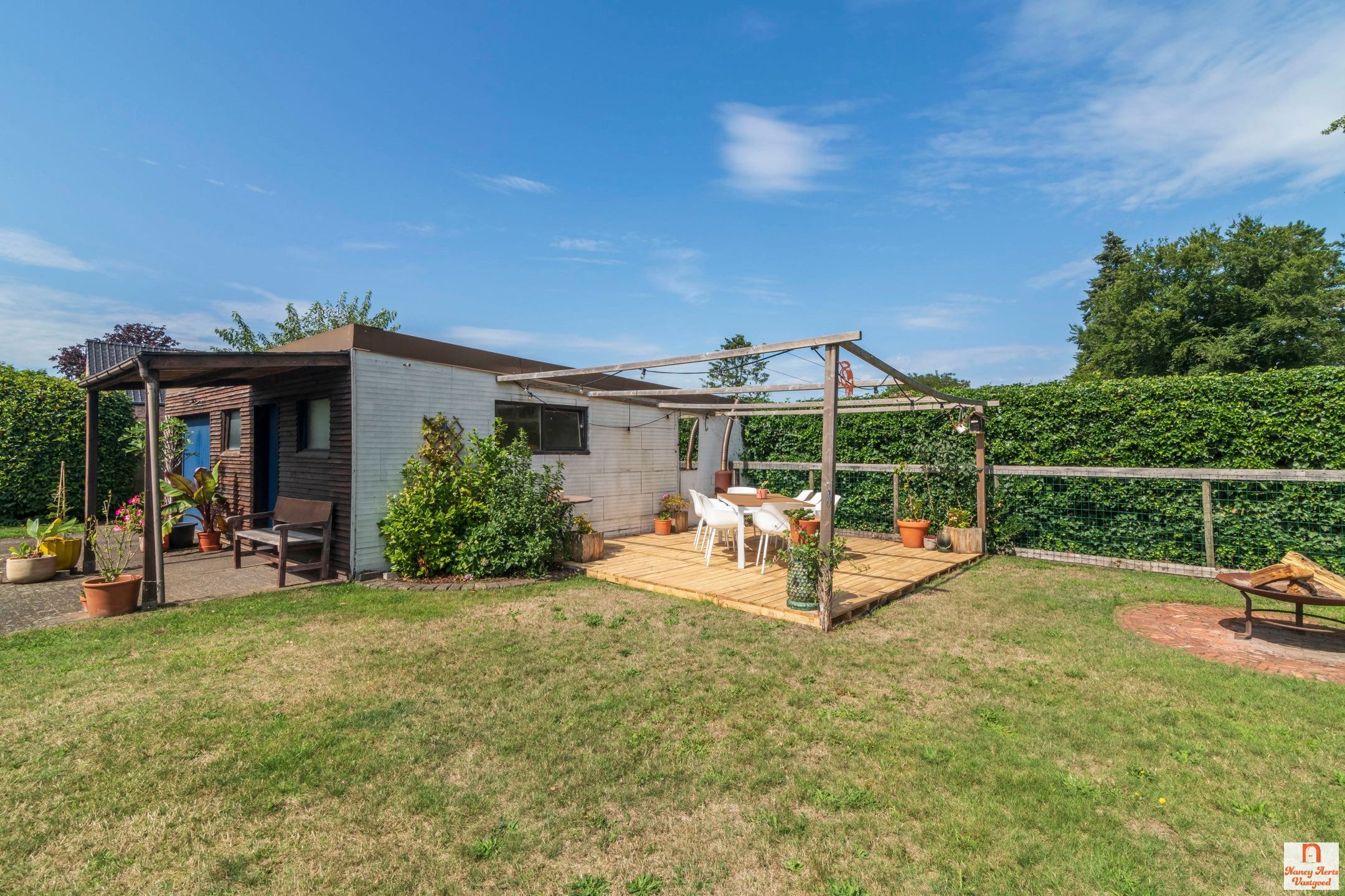 Sfeervolle jaren ’60-woning met grote tuin in rustige straat foto 49