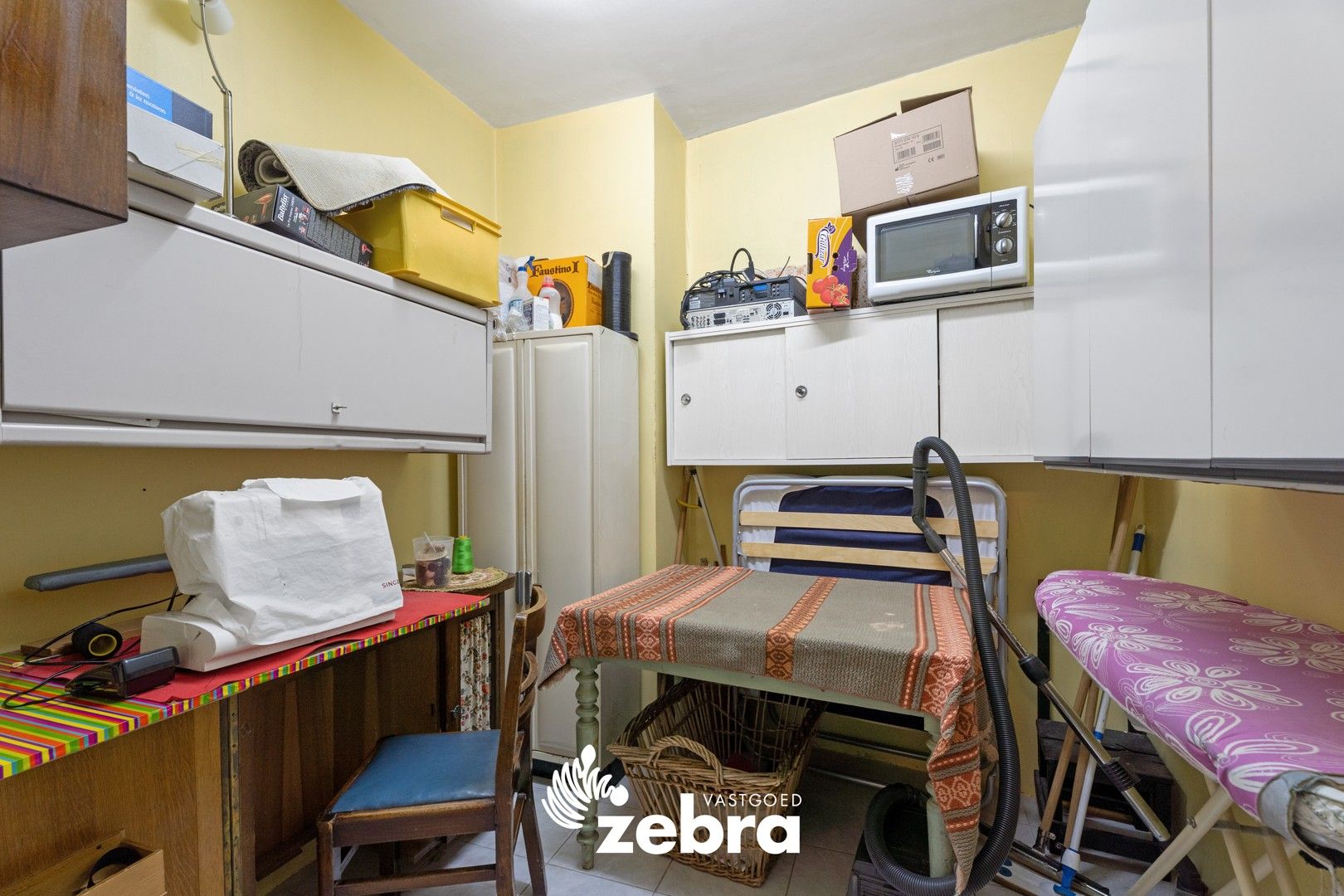Op te frissen woning met vier slaapkamers en dubbele garage te Meulebeke! foto 15