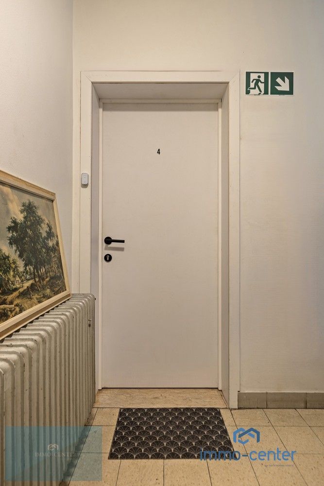 Instapklaar 2-slaapkamer appartement met vernieuwde keuken en badkamer in het hart van Genk foto 16