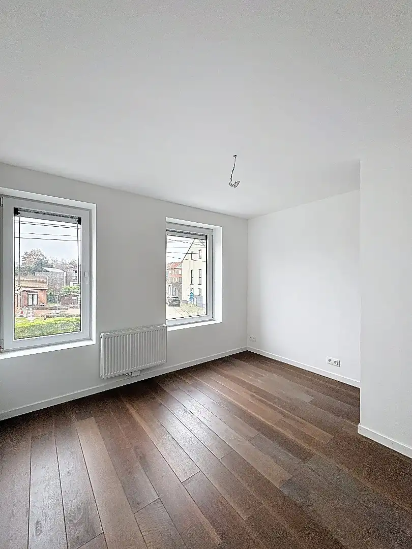 Elegant wonen in Tienen: gerenoveerde rijwoning met 3 slaapkamers en zuidwestgerichte tuin. foto 13