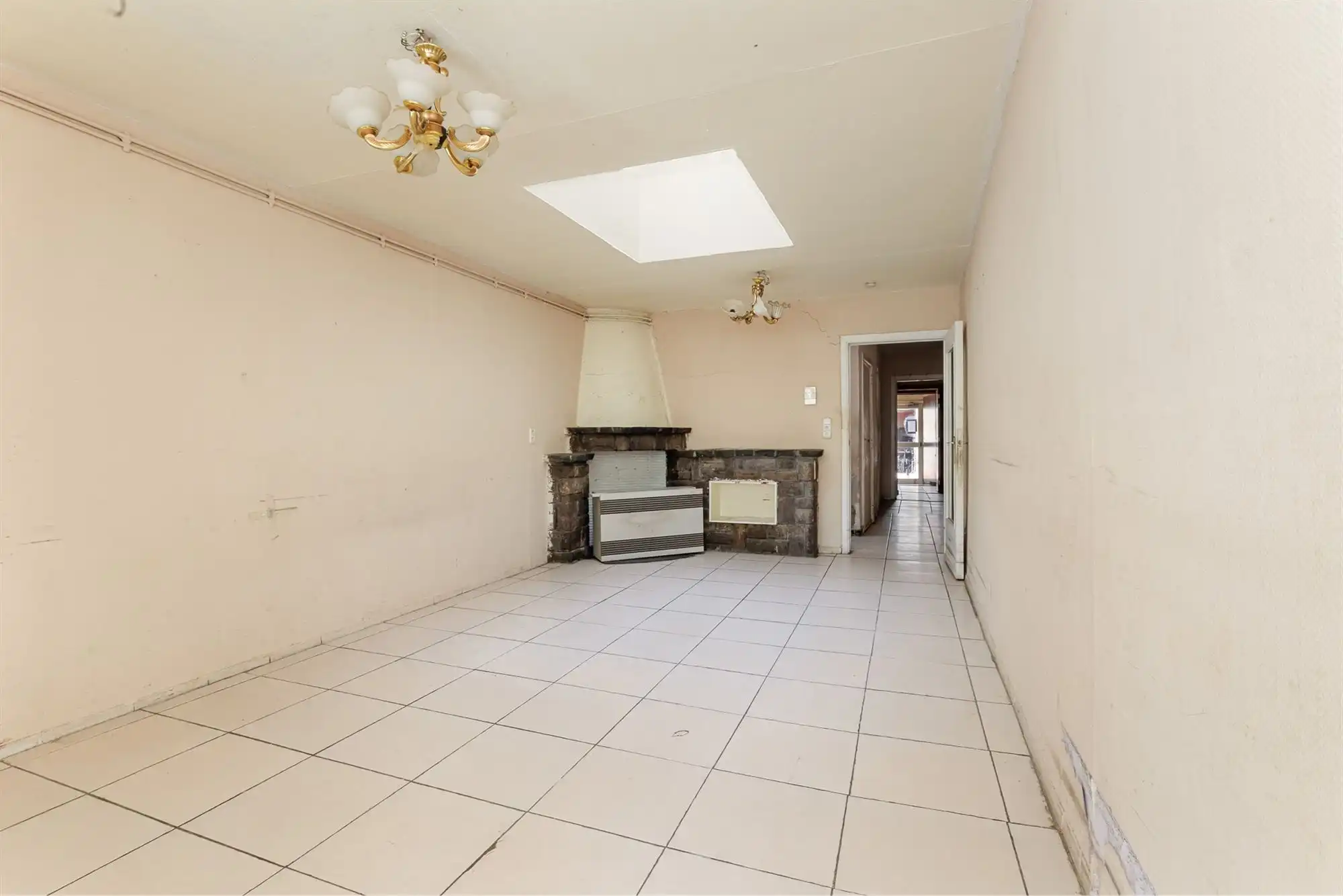 Te renoveren woning met veel potentieel te Mechelen foto 3