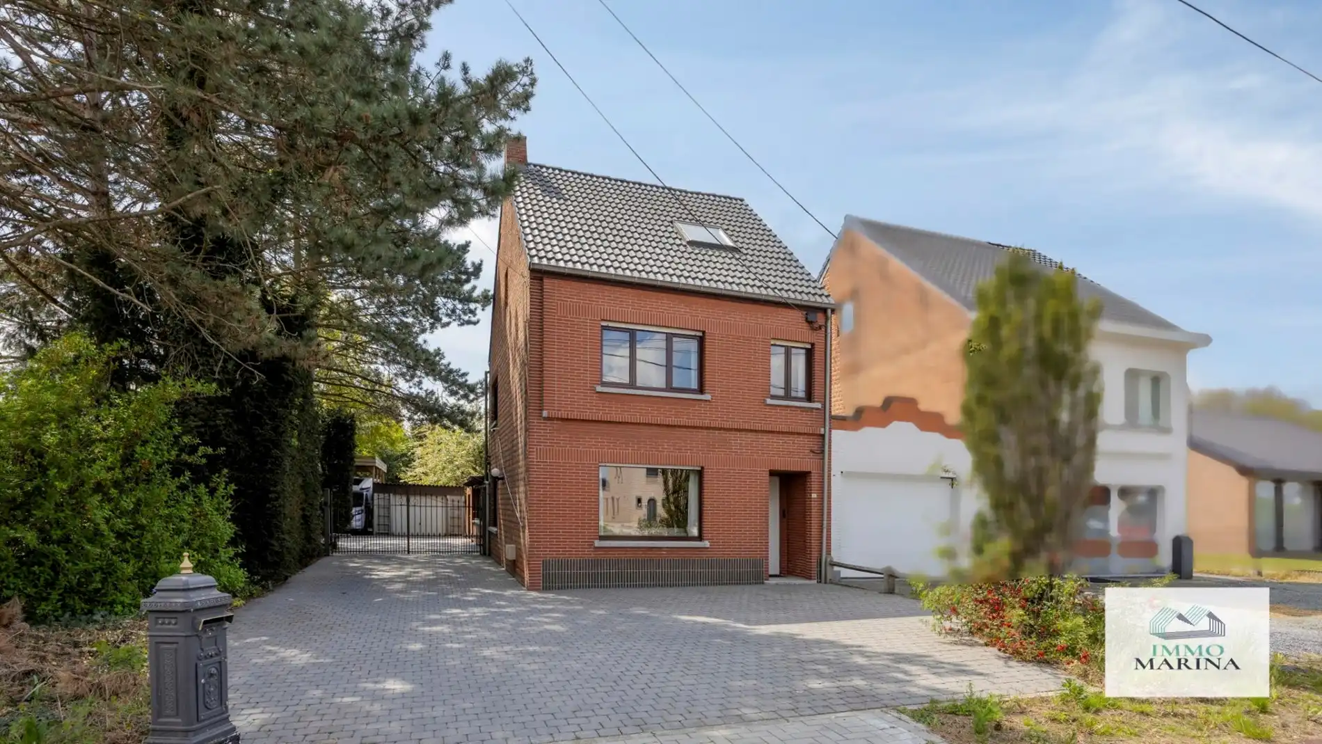 Ruime woning met zuid tuin, carport te Booischot. foto {{pictureIndex}}