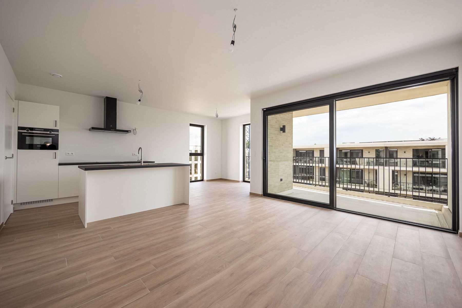 Prachtig nieuwbouwappartement op de 3de verdieping met ondergrondse autostaanplaats en berging. foto 2