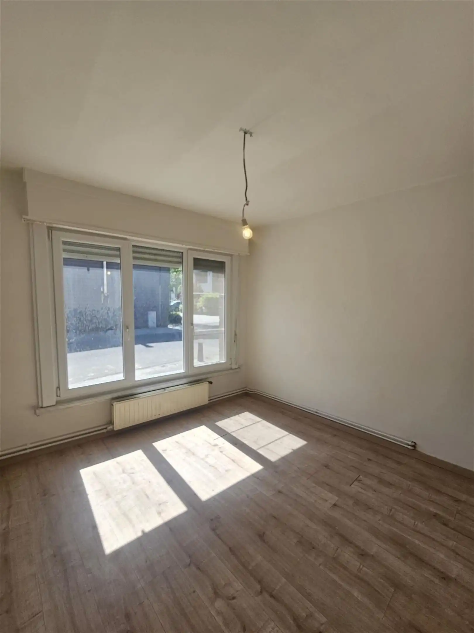 Instapklaar gelijkvloers appartement met stadstuintje! foto 4