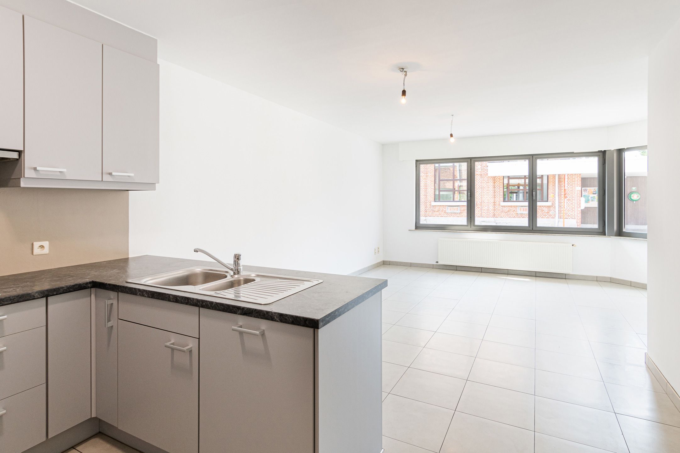 Gelijkvloers appartement met 2 slaapkamers! foto 7