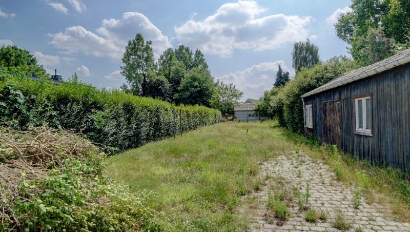 Projectgrond voor meergezinswoningen met af te breken gebouw foto 3