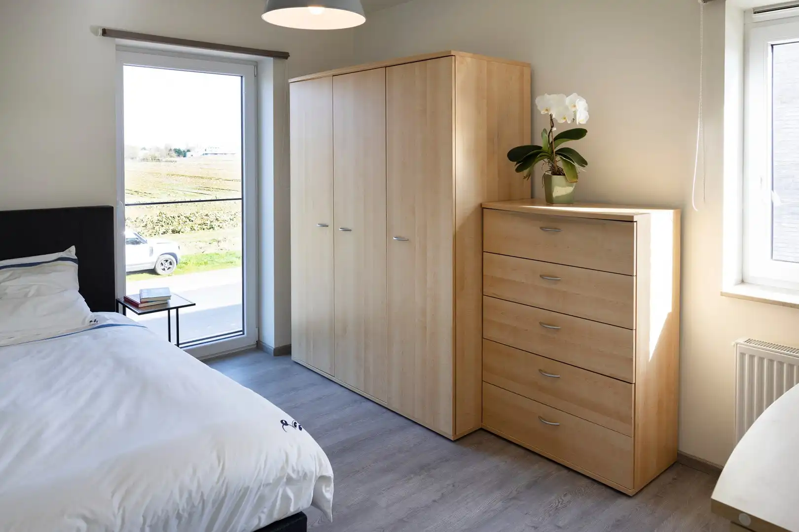 Jonge halfopenwoning met inpandige garage en aangename tuin. foto 12