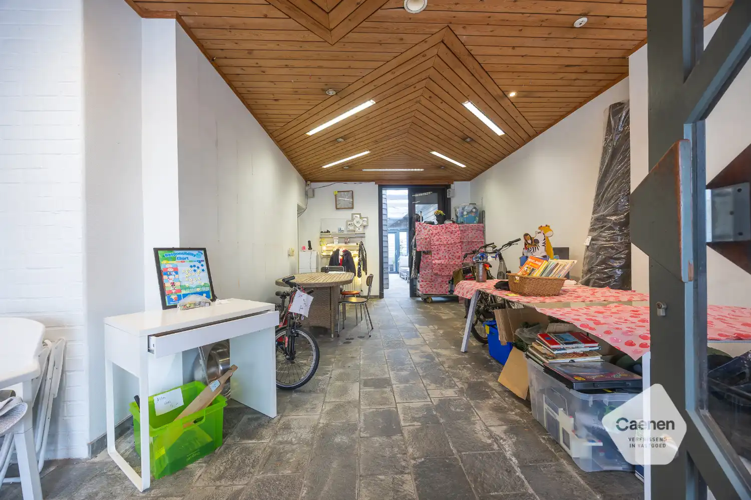 Woning met handelsgelijkvloers op commerciële ligging foto 3