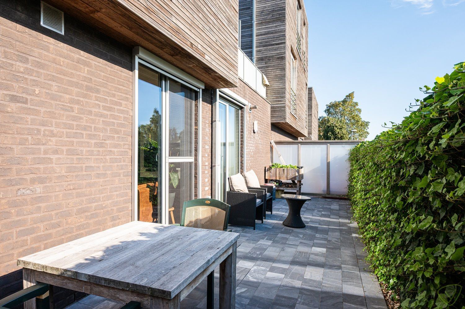 Instapklare woning met zonnige terrassen en garagebox foto 21