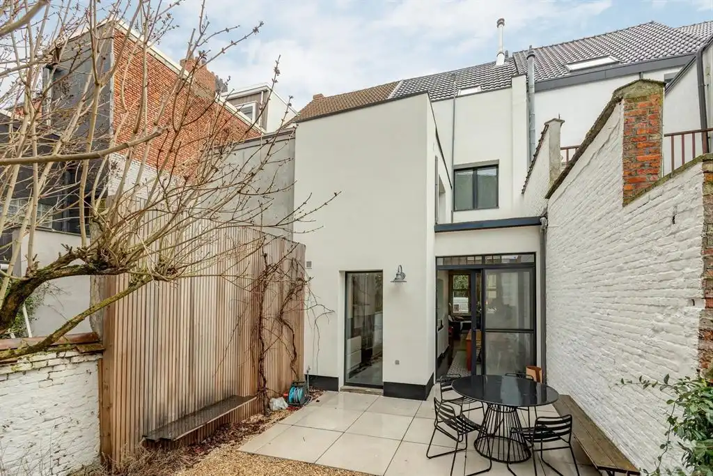 Sfeervol, instapklaar herenhuis met 4 slaapkamers & mediterraanse tuin in hartje Harmoniewijk foto 5