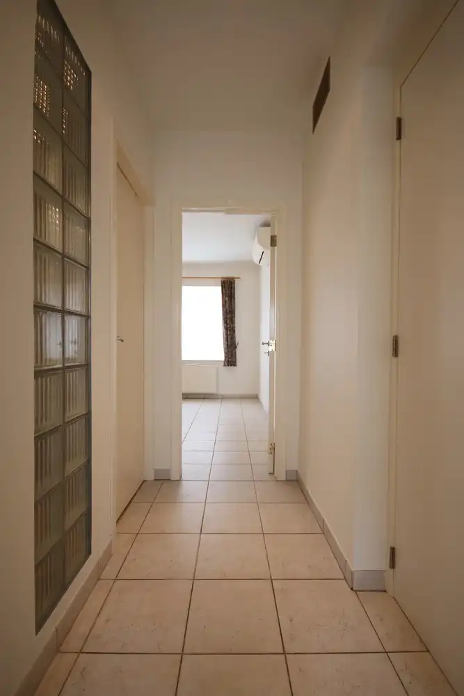 Gunstig gelegen woning met zeer veel lichtinval met minstens 2 slaapkamers foto 9