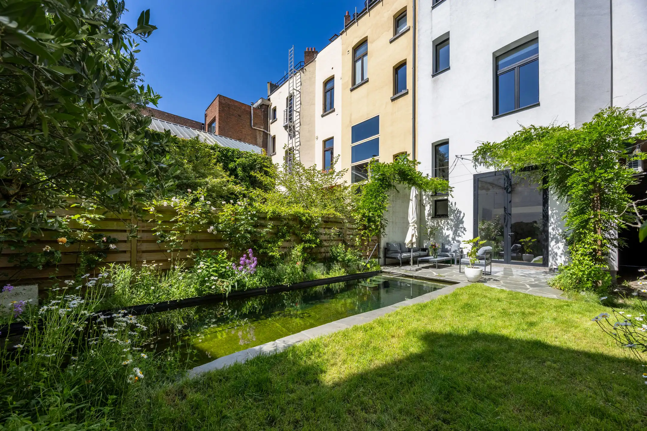 Uniek herenhuis met zwemvijver aan het Zuidpark foto 30