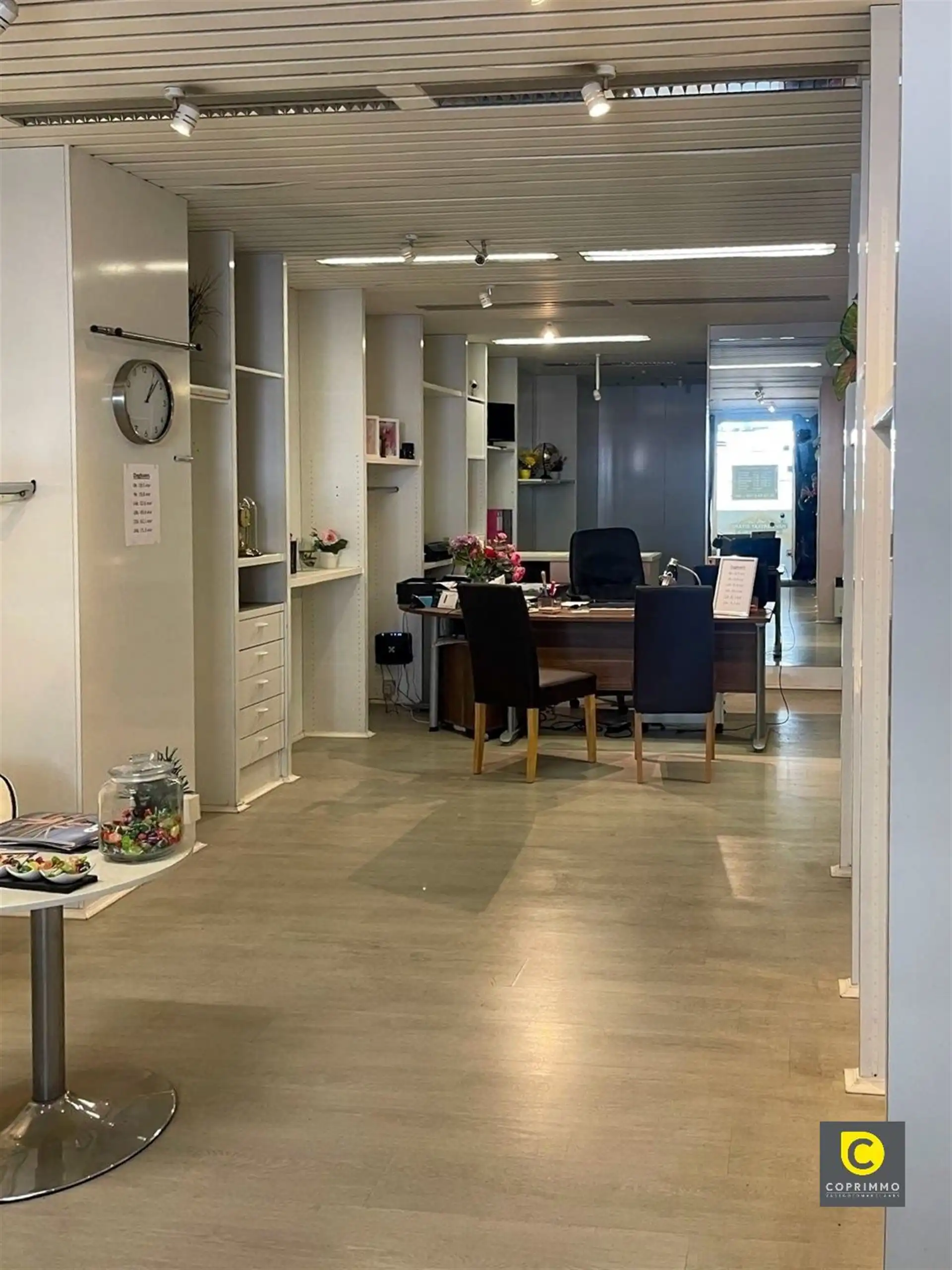 Opbrengsteigendom met 2 app en handelsruimte foto 8