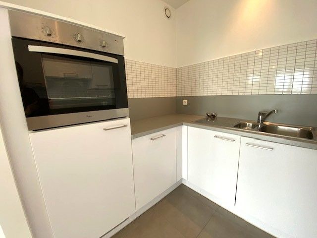 Topligging 1 slpka appartement + terras + autostaanplaats centrum Geel foto 10