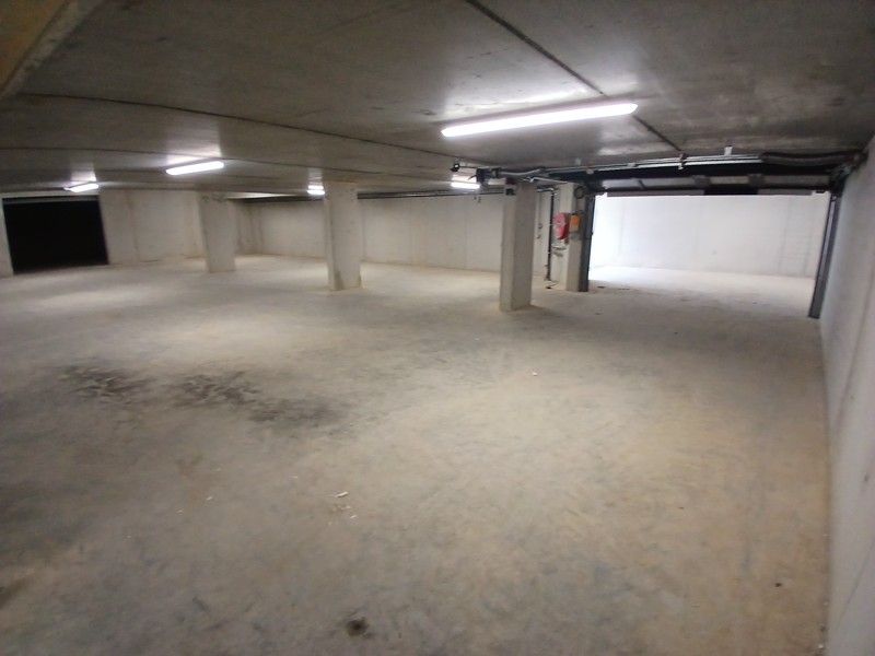 Gelijkvloers nieuwbouw appartement met terras en tuin gelegen in het centrum van Opglabbeek foto 17