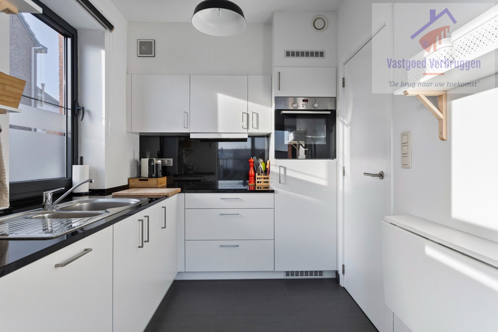 Modern, energiezuinig gelijkvloers appartement met garagebox in Iddergem foto 8