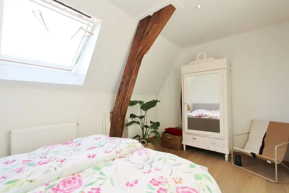 Gezellige triplex op toplocatie met 2 slaapkamers, terras en ondergrondse autostaanplaats foto 21