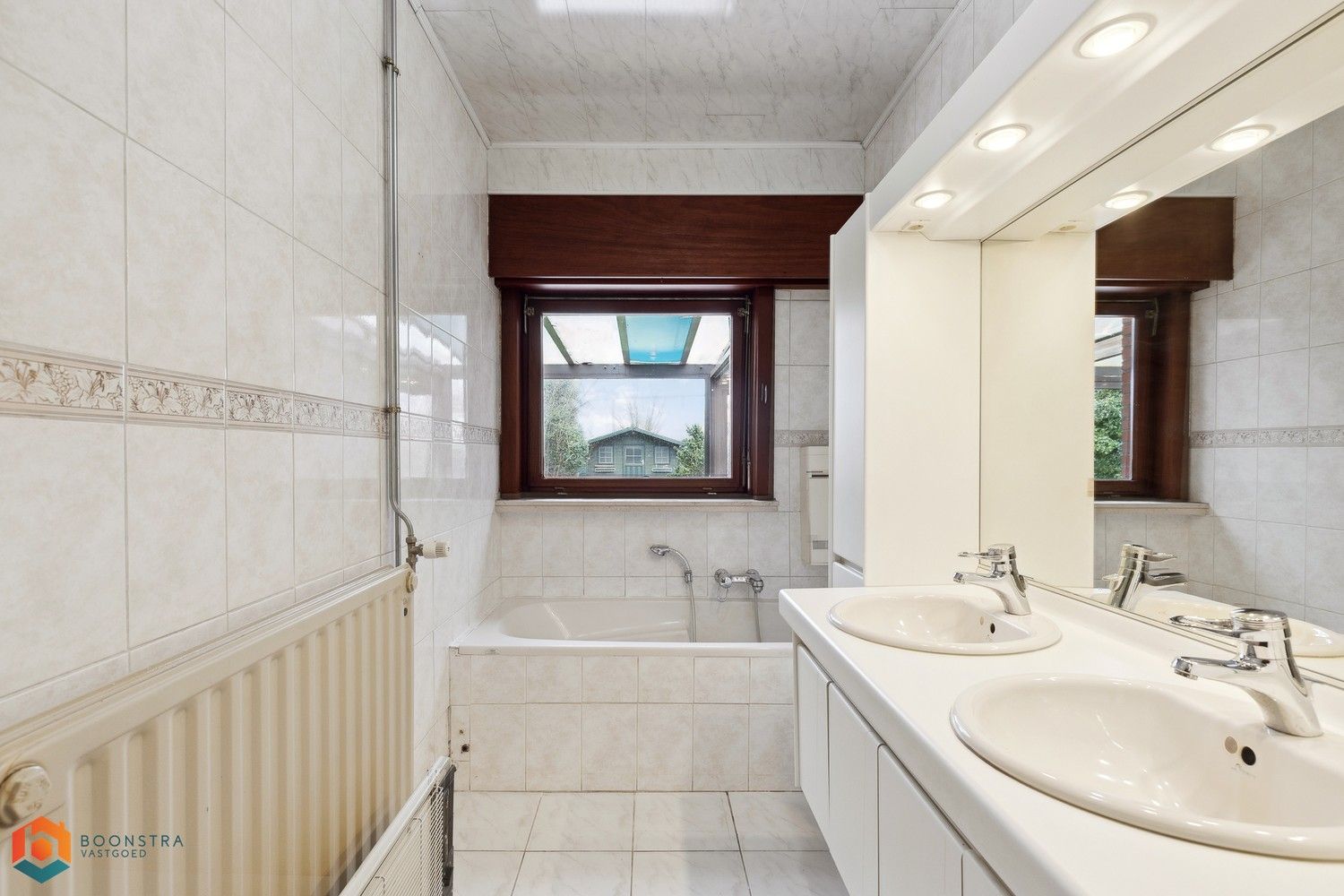 Te renoveren woning met 3 slpkrs en garage te Hombeek foto 15