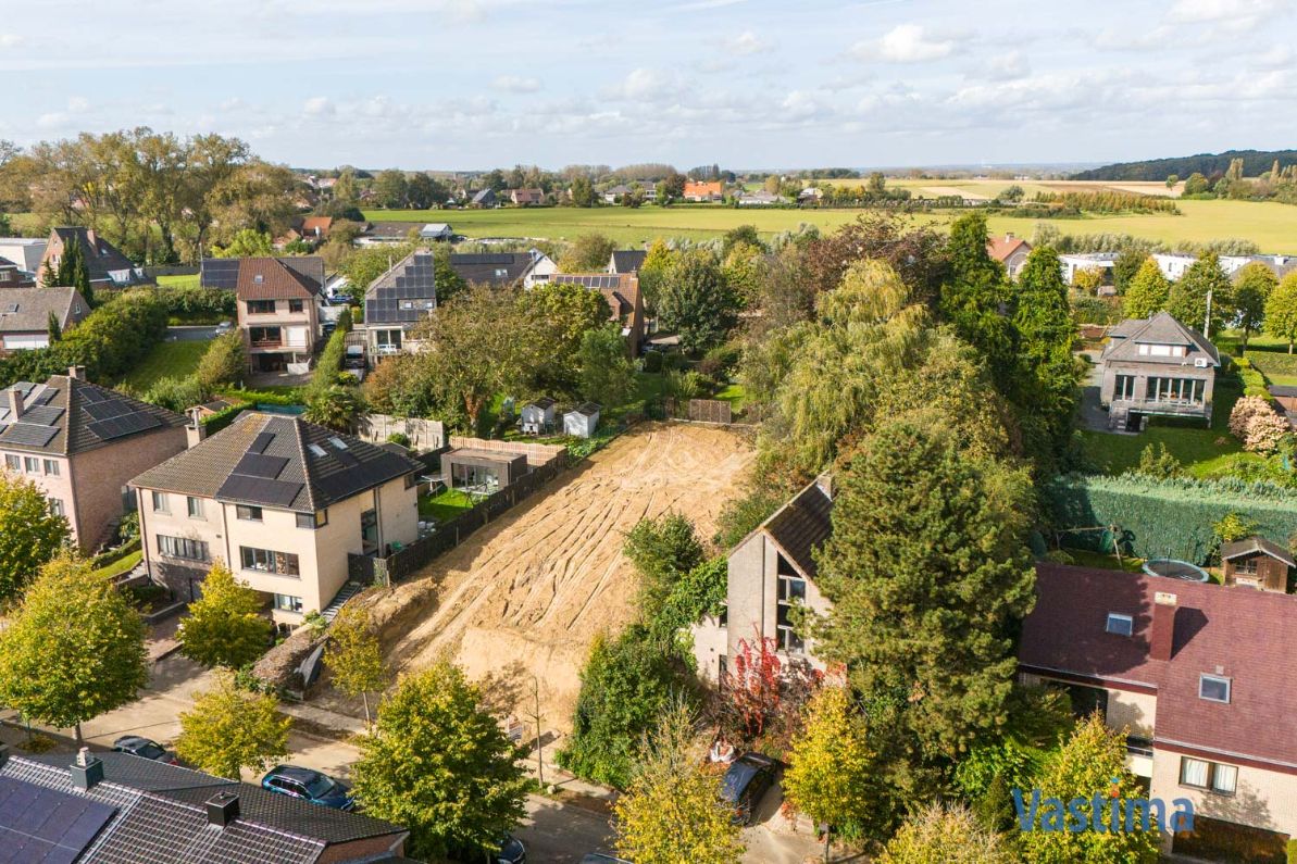 Bouwklare grond voor open bebouwing nabij centrum Asse foto 1