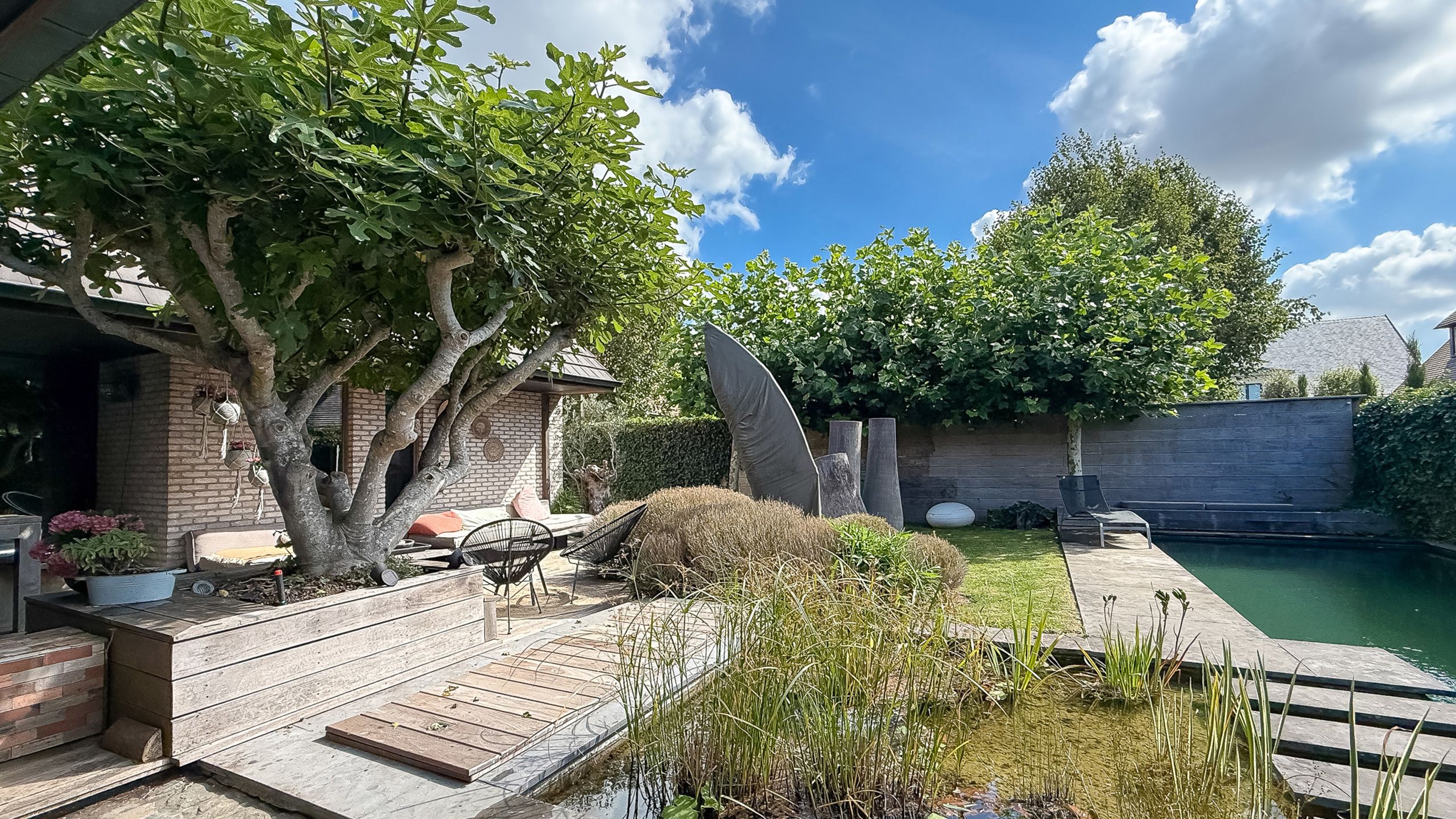 Villa met privé- en praktijkgedeelte – stijlvolle tuin foto 4