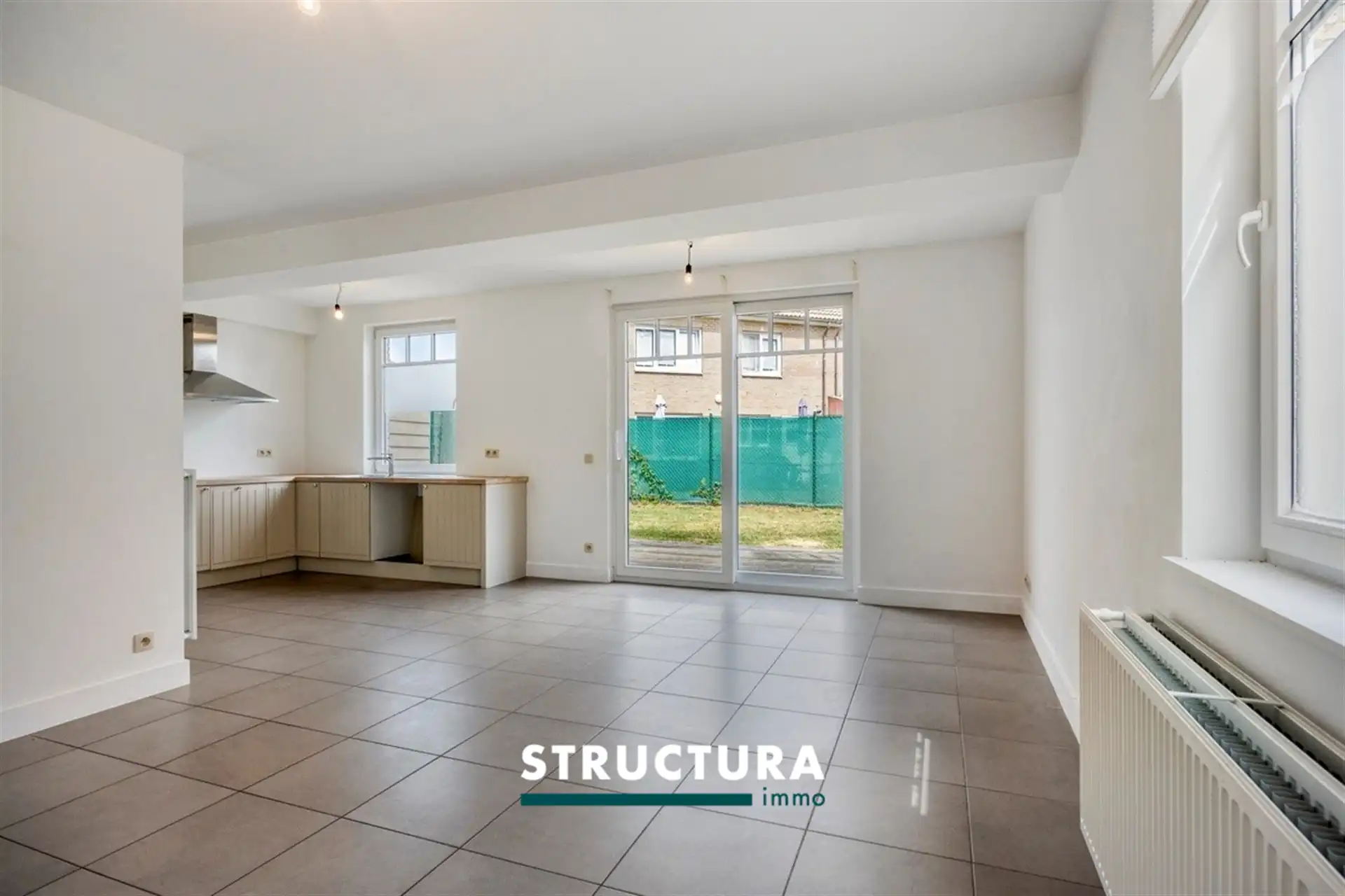 Gelijkvloers appartement met tuin nabij centrum foto 2