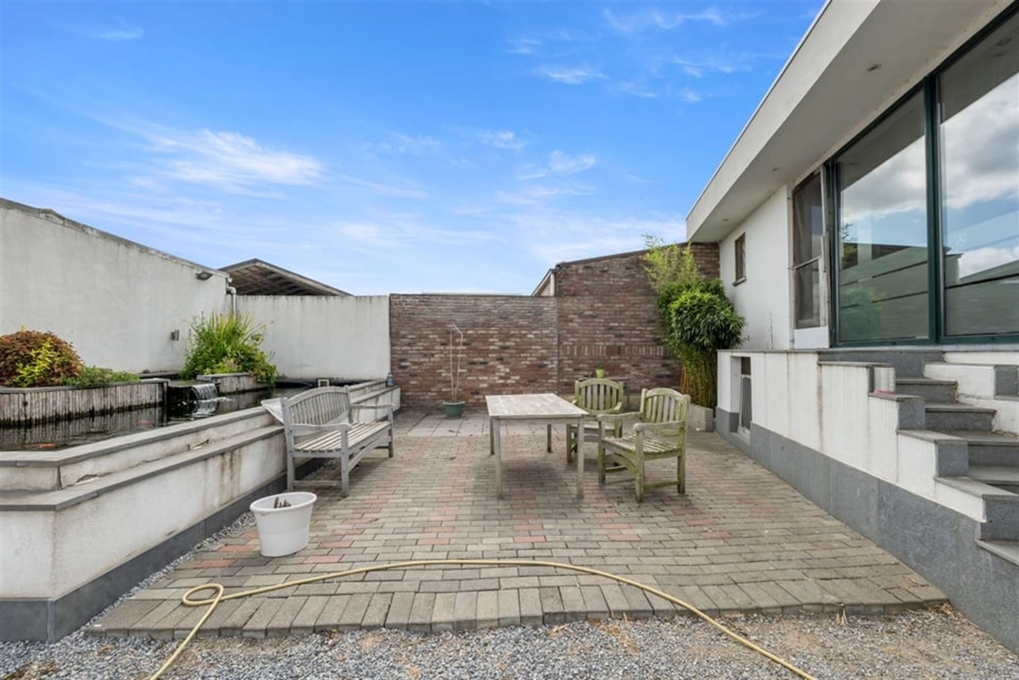 RUIME GEZINSWONIG MET VEEL POTENTIEEL EN EEN RUIME GARAGE IN SINT-TRUIDEN  foto 39