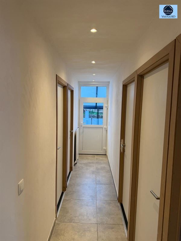 WONING MET HANDELSRUIMTE EN 3 SLAAPKAMERS foto 7