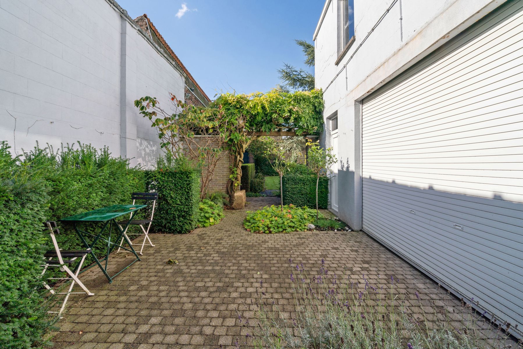 Karaktervolle ruime woning  met bijgebouw/atelier en stadstuin in het centrum foto 23