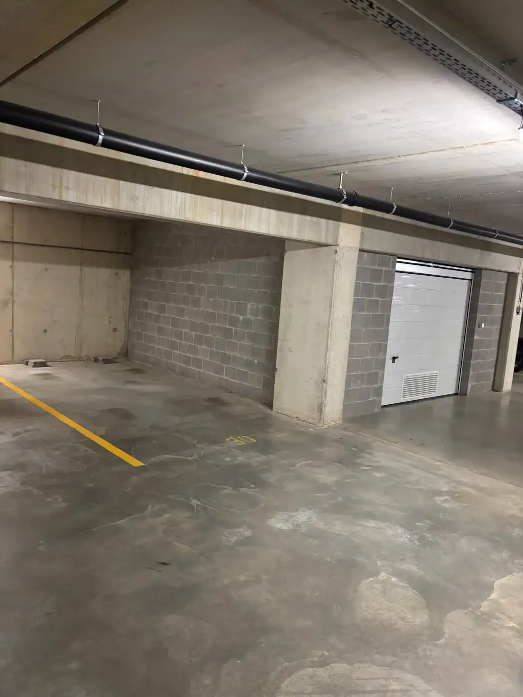 Staanplaats in ondergrondse garage in het centrum van Tienen  foto 4