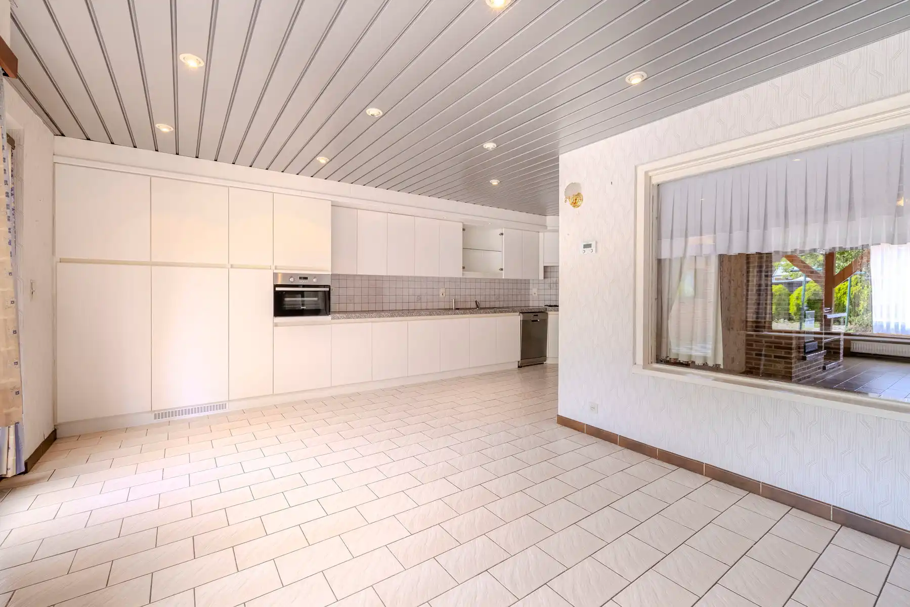 Op te frissen woning met 3 slpks, garage en gezellige tuin foto 7