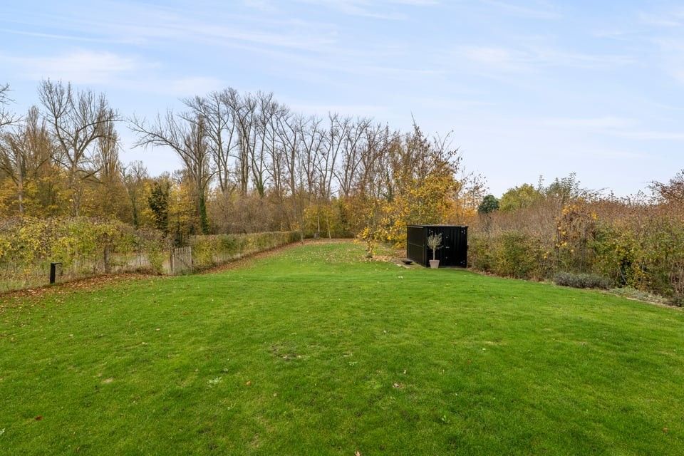 MODERNE HALFOPEN BEBOUWING MET INPANDIGE GARAGE EN RUIME TUIN IN SINT-TRUIDEN foto 3