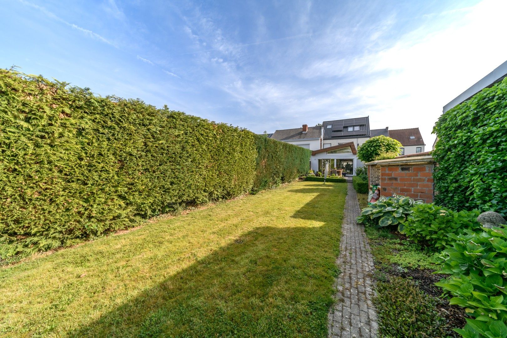 Instapklare gezinswoning met ruime tuin te Terjoden (Erembodegem) foto 29