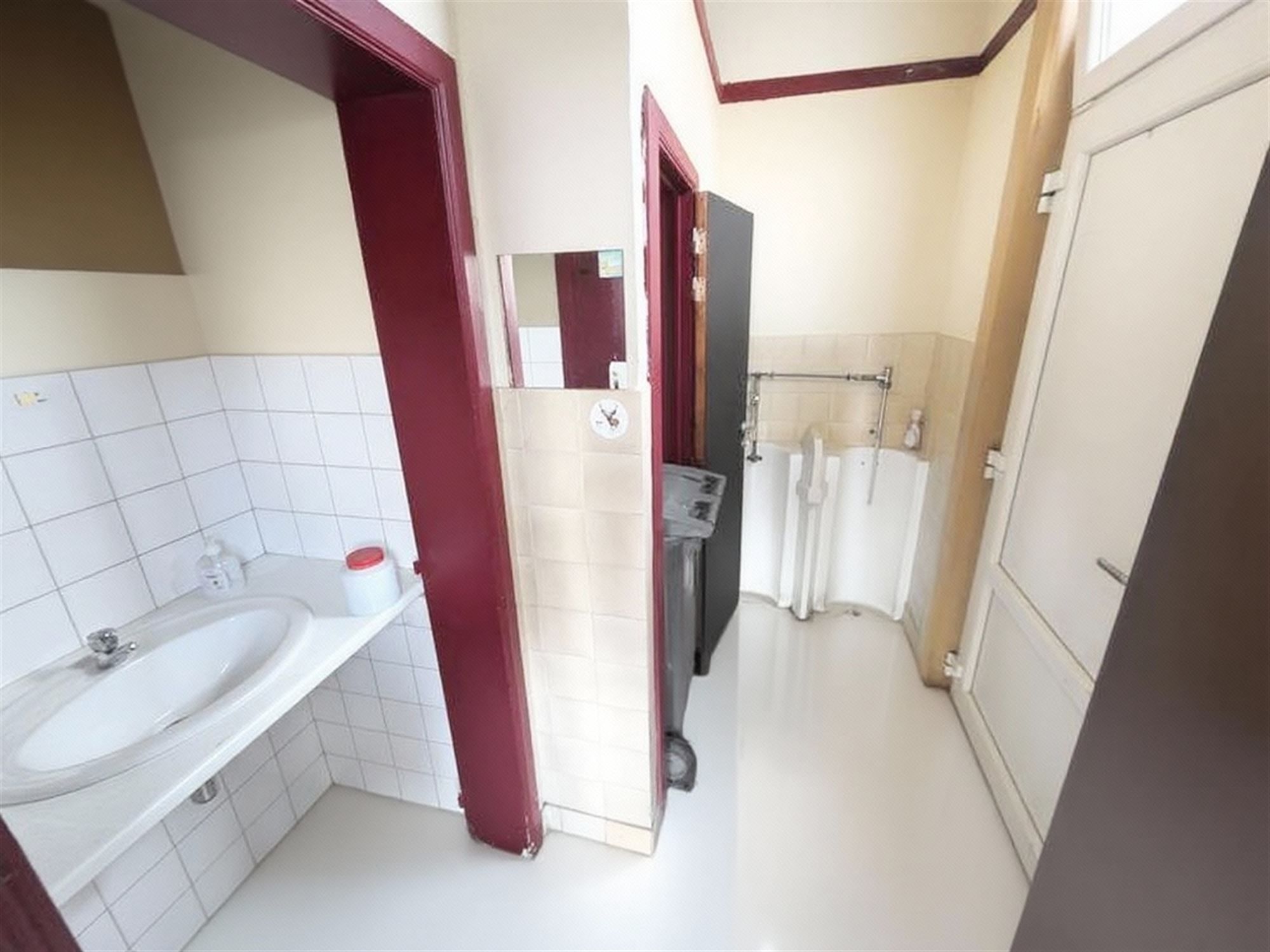 Een stadswoning met klasse én commerciële troef foto 15