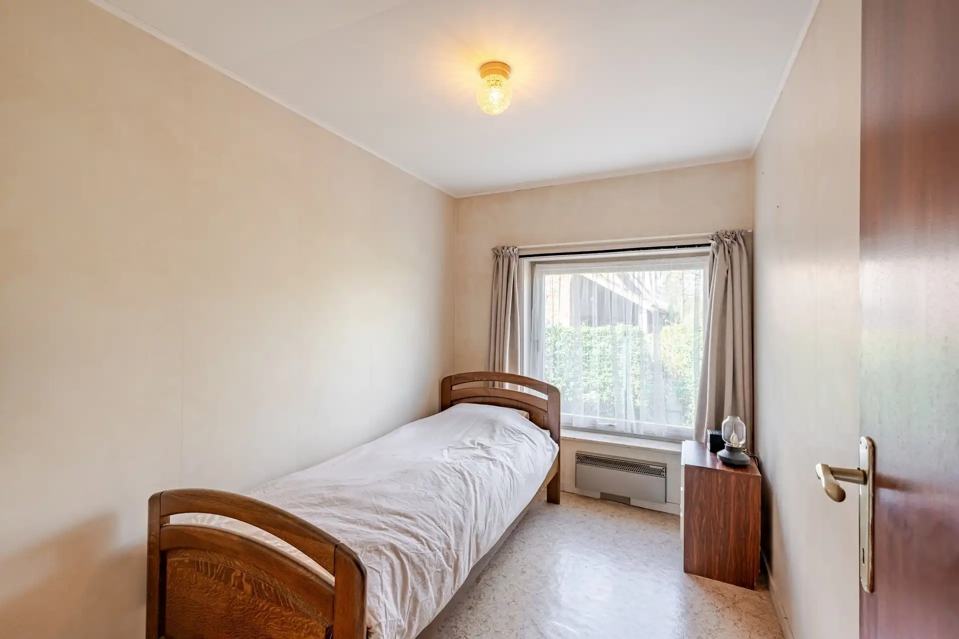 Bungalow met 4 slks, tuin en dubbele garage foto 15