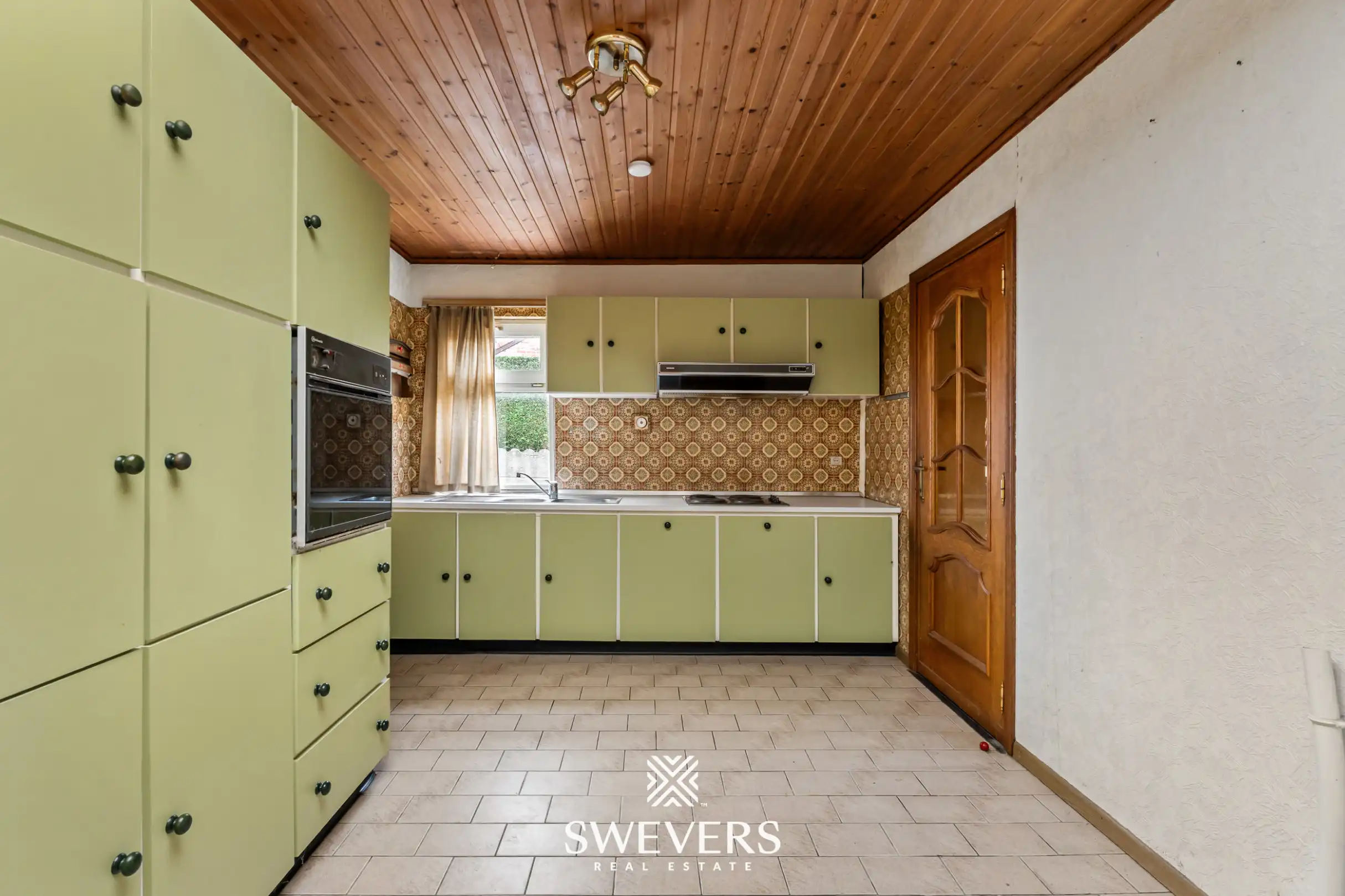 Woning met veel potentieel en ruime tuin in Borgloon foto 12