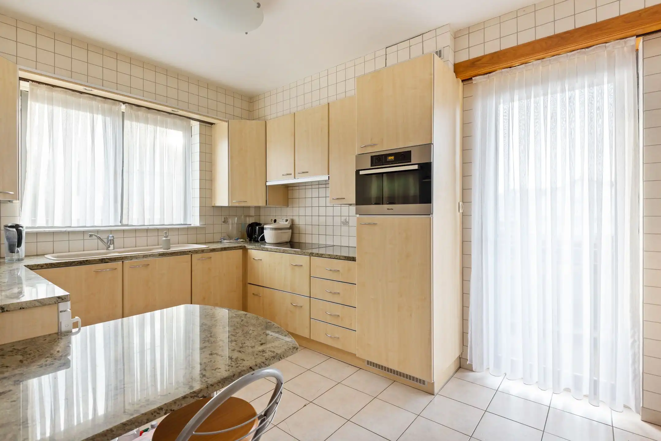 Opbrengsteigendom met 3 appartementen + garageboxen in Wommelgem te koop! foto 20