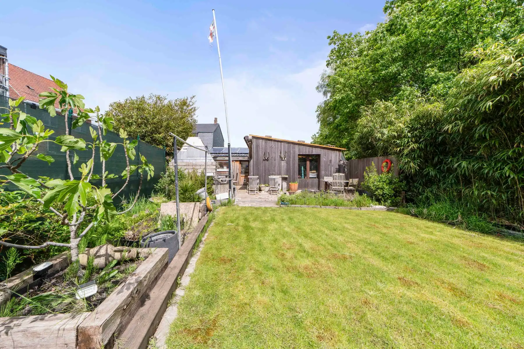 Stijlvolle, instapklare woning met moderne afwerking en gezellige tuin in Genk foto 20