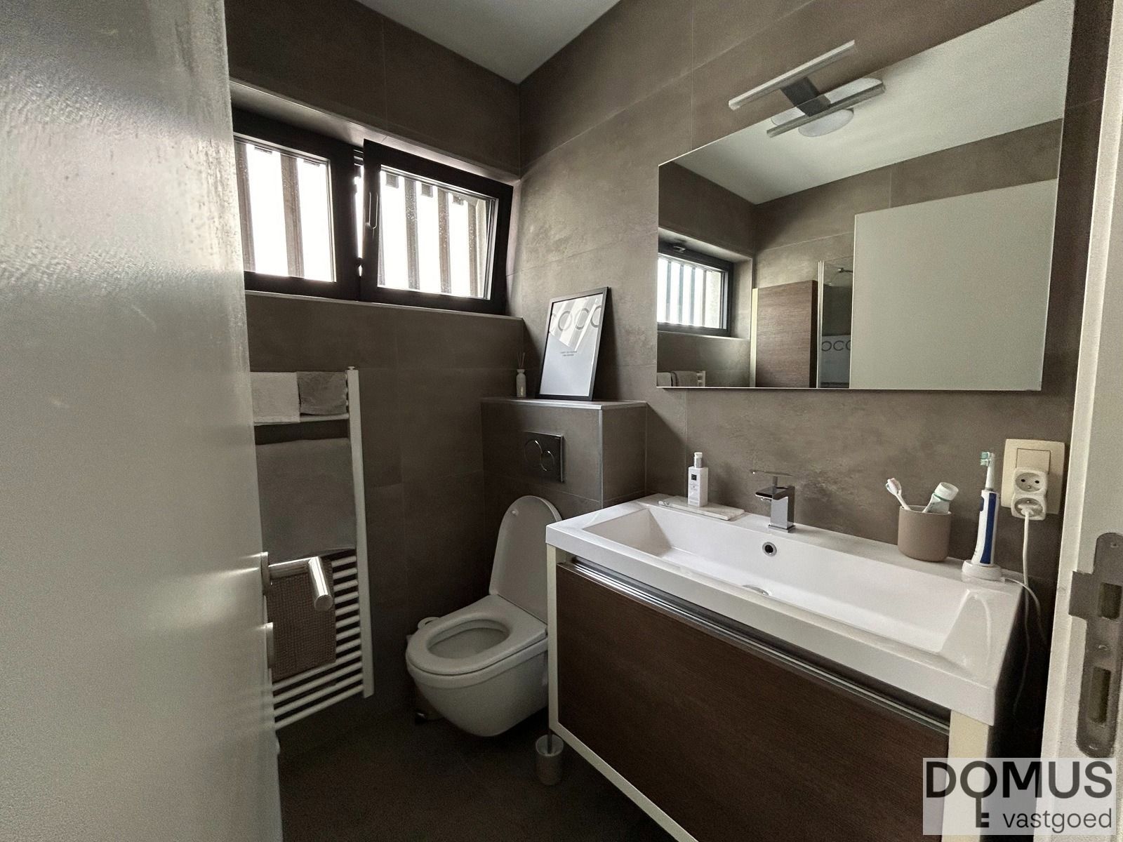 Charmant 1-slaapkamerappartement met terras en garage foto 9