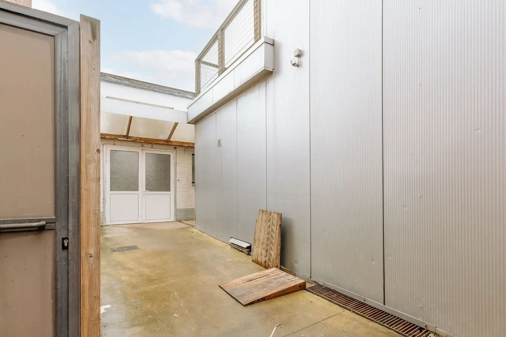 Ruim handelspand met magazijn in centrum Borsbeek. foto 19