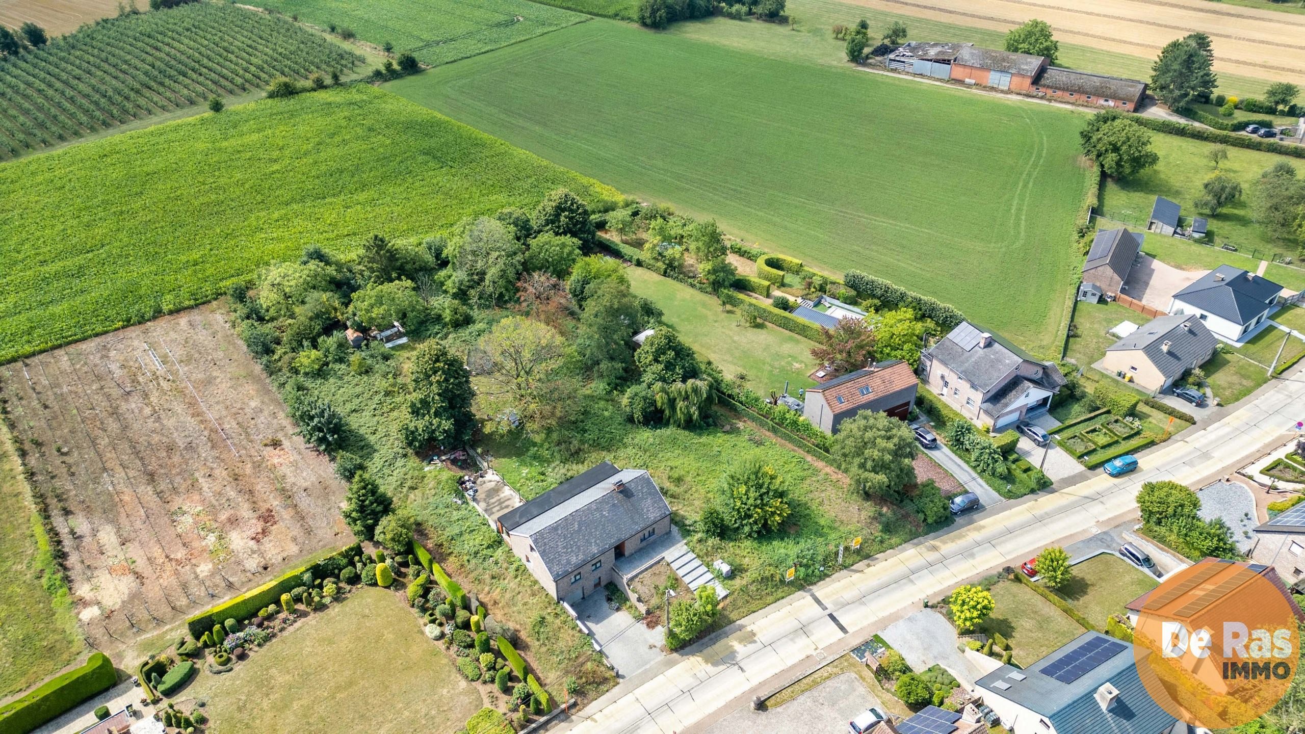 BEKKEVOORT - Zuidgerichte bouwgrond in groene omgeving foto 11