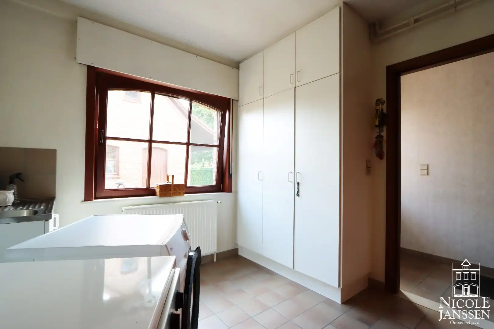 Instapklare en ruime gezinswoning met garage en diepe tuin in het gezellige Beek foto 17