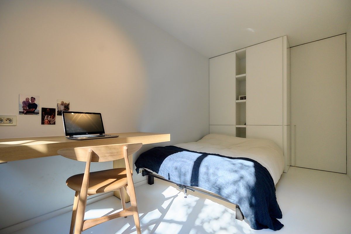 Buitengewone interbellum architecten-burgerwoning met tuin die omgevormd werd tot een hedendaagse luxueuze concept-woning. foto 19