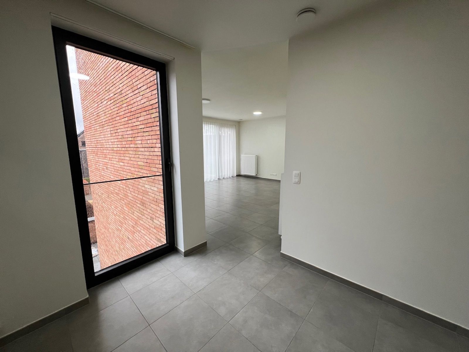 Recent dakapp met 2slpk, terras en parking foto 9