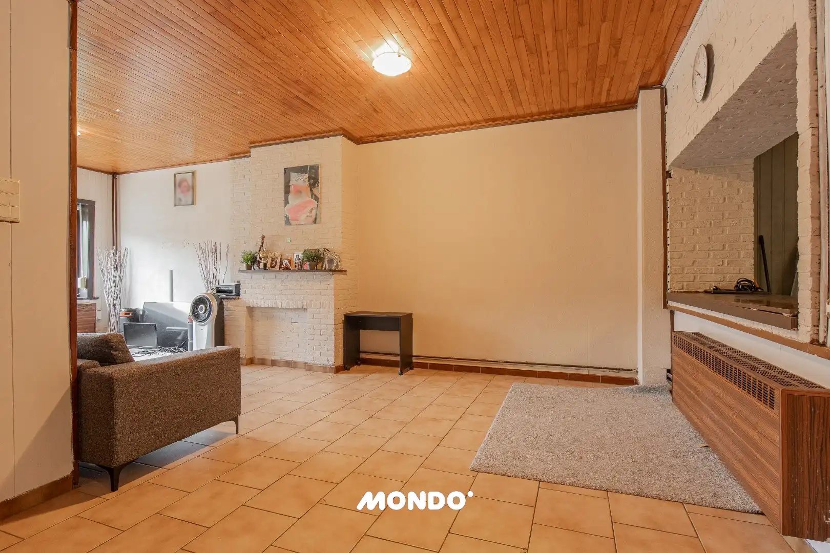 Deels gerenoveerde gezinswoning met 5 à 6 slaapkamers en tuin met achteruitweg foto 5