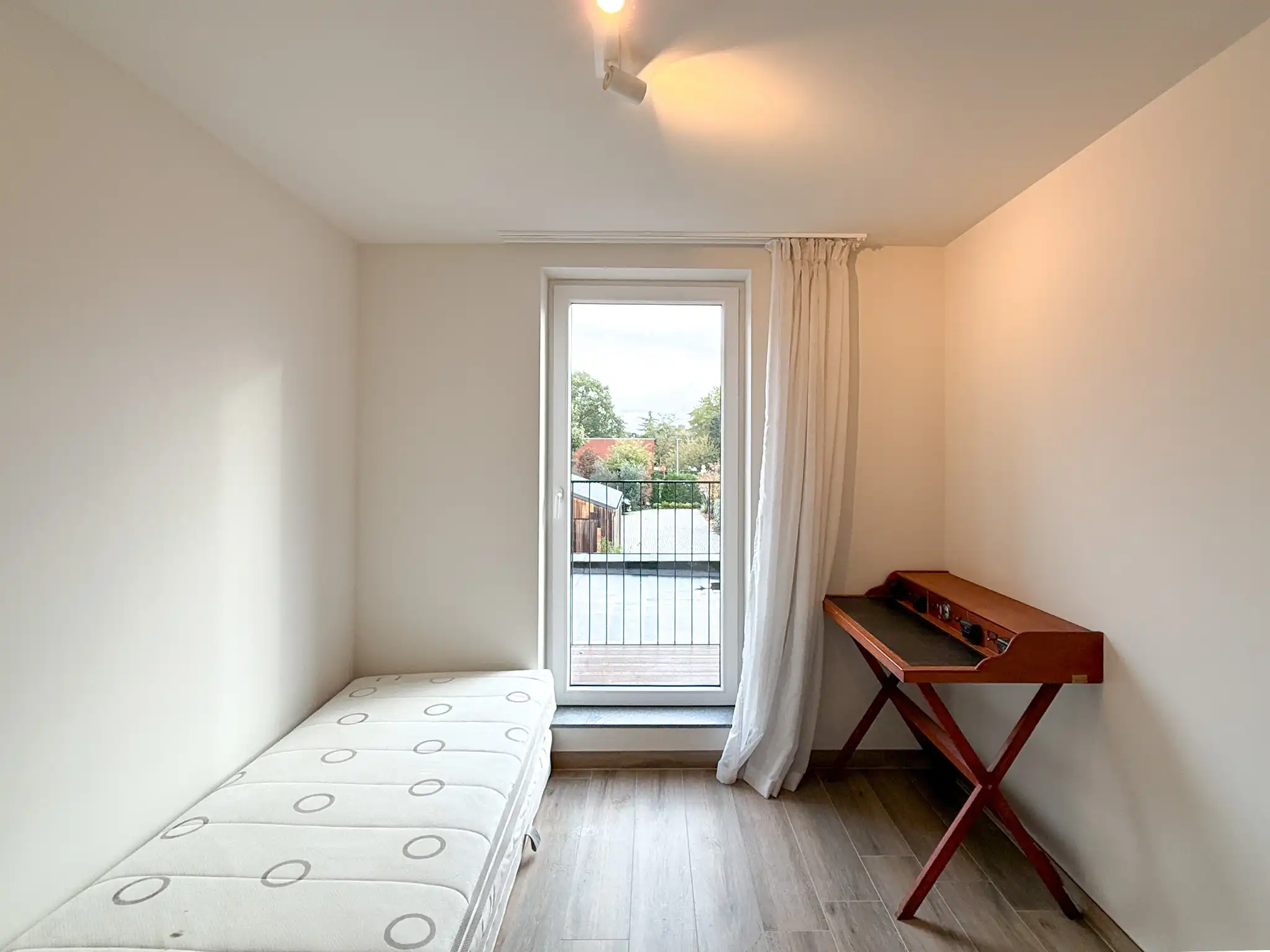 Energiezuinig appartement met twee slaapkamers en autostaanplaats dichtbij centrum Beveren foto 18
