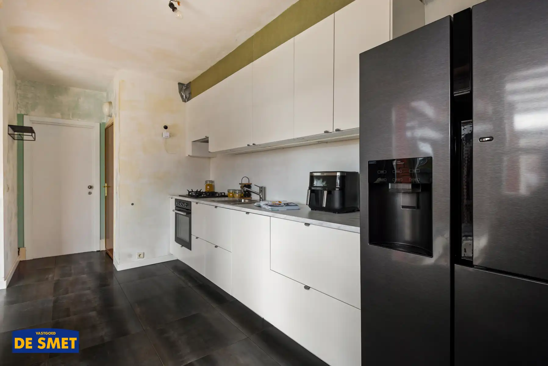 Appartement met tuin, garage + oprit, berging en 2 kelders foto 6