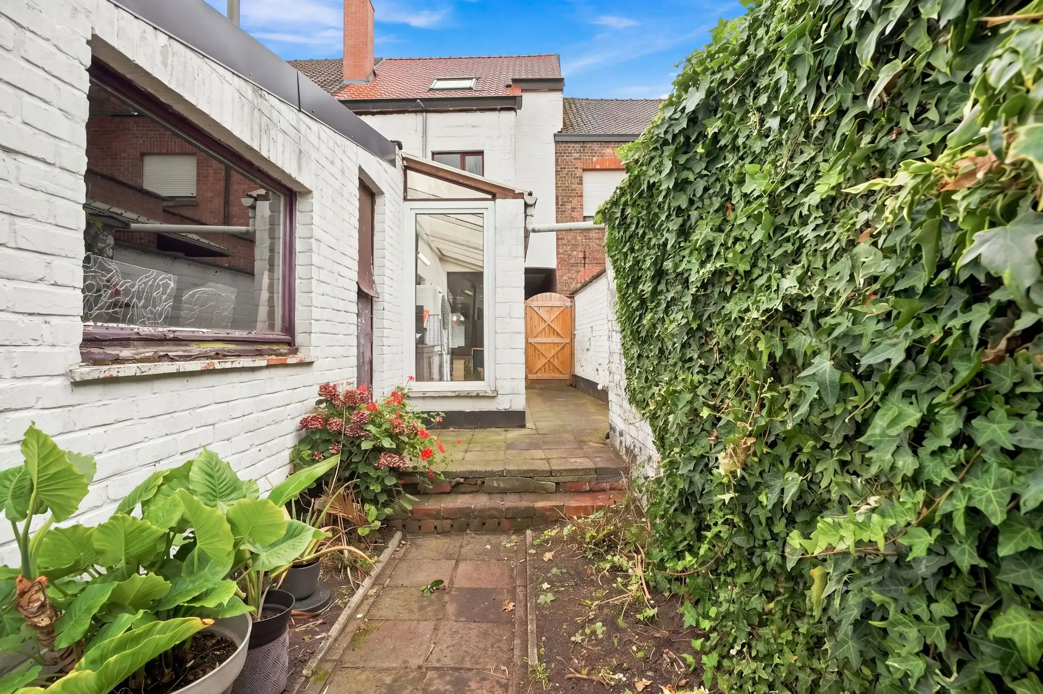 Ruime en praktische te renoveren rijwoning in Sint-Michiels foto 13