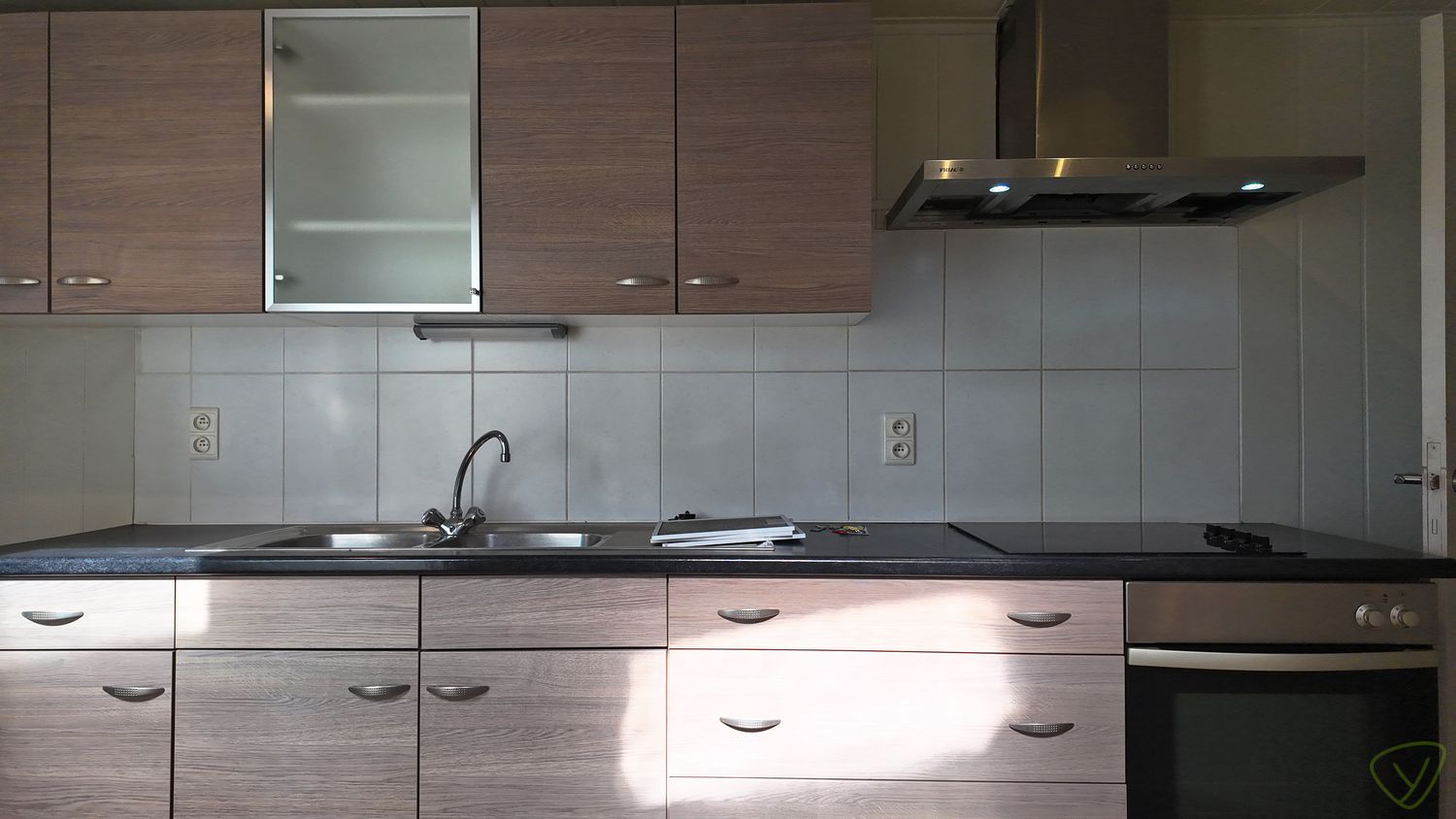 Gezellige stadswoning te huur met ruime garage en parking! foto 7