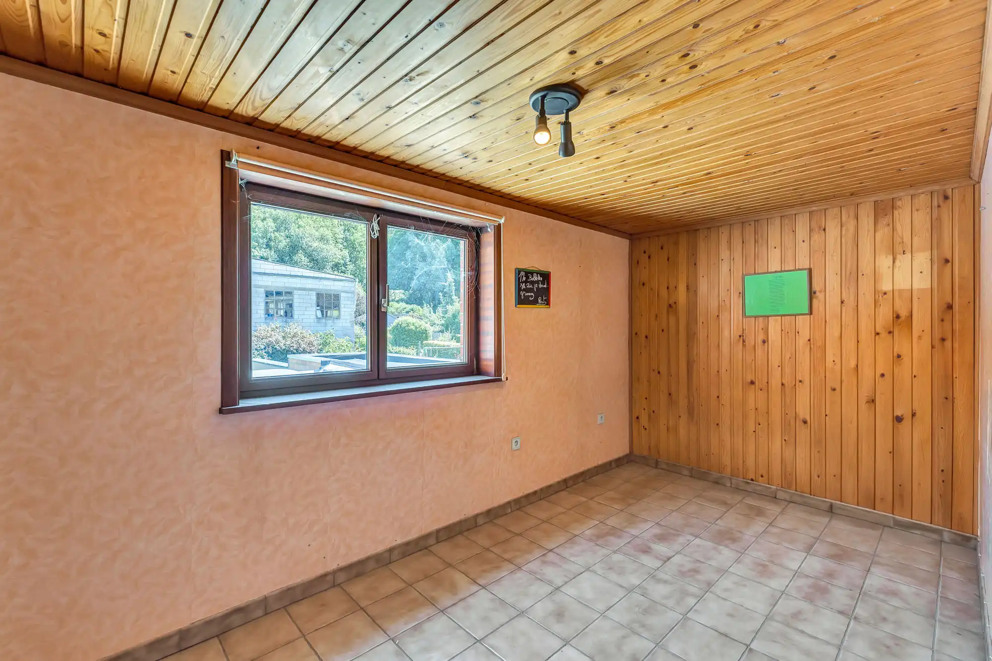 Te renoveren woning met garage en tuin foto 15