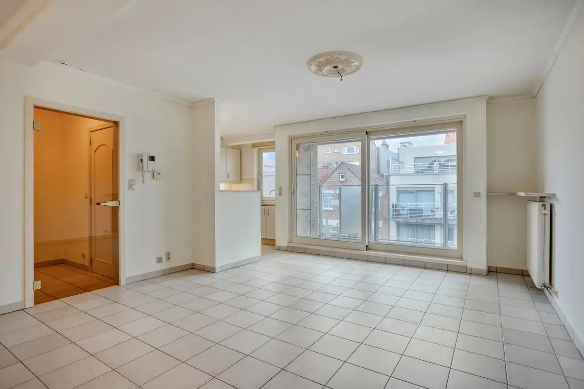 Ruim 2 slaapkamer appartement in het hartje van Koksijde met aankoopmogelijkheid van een garage foto 5